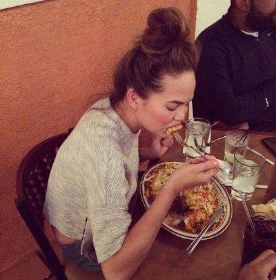 chrissy teigen eating meal chrissy teigen eating meal