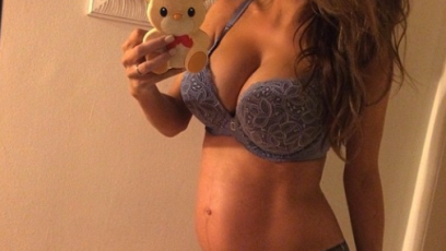 Pregnant lingerie model baby bump