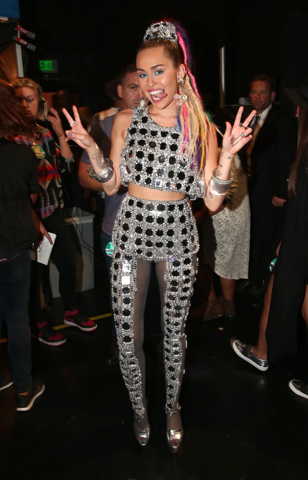 The Ultimate Guide to Miley Cyrus' Crazy Outfits at the MTV VMAs - Life ...