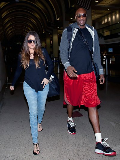 khloe kardashian and lamar odom walking in the airport