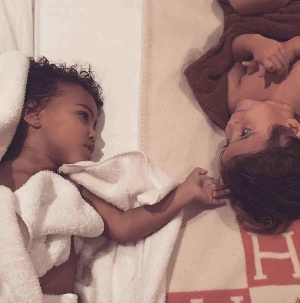North and p laying down insta selfie