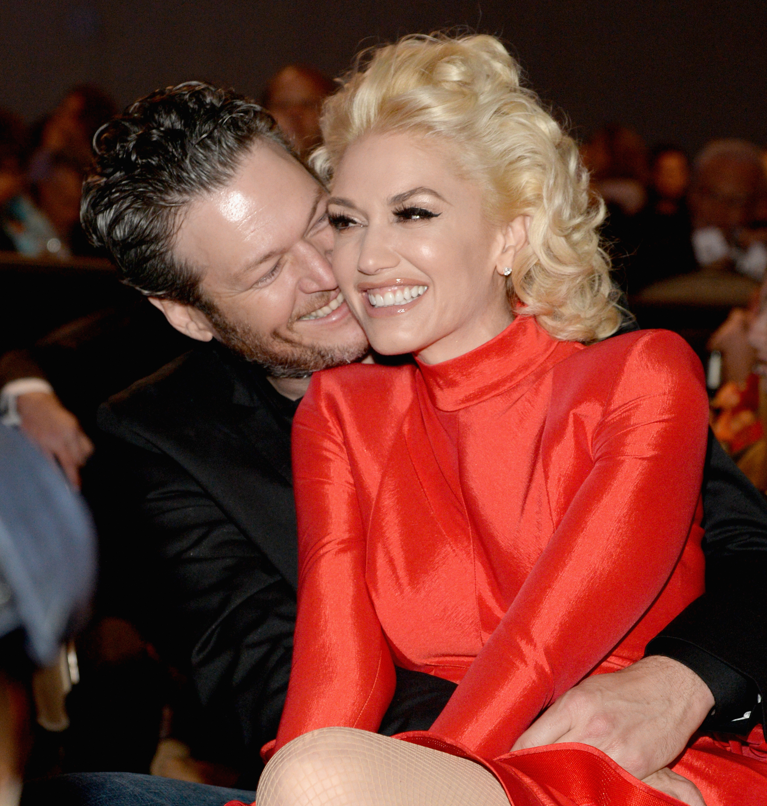 Blake and Gwen showing PDA at an event