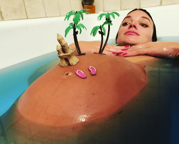 Laura peego baby bump bathtub