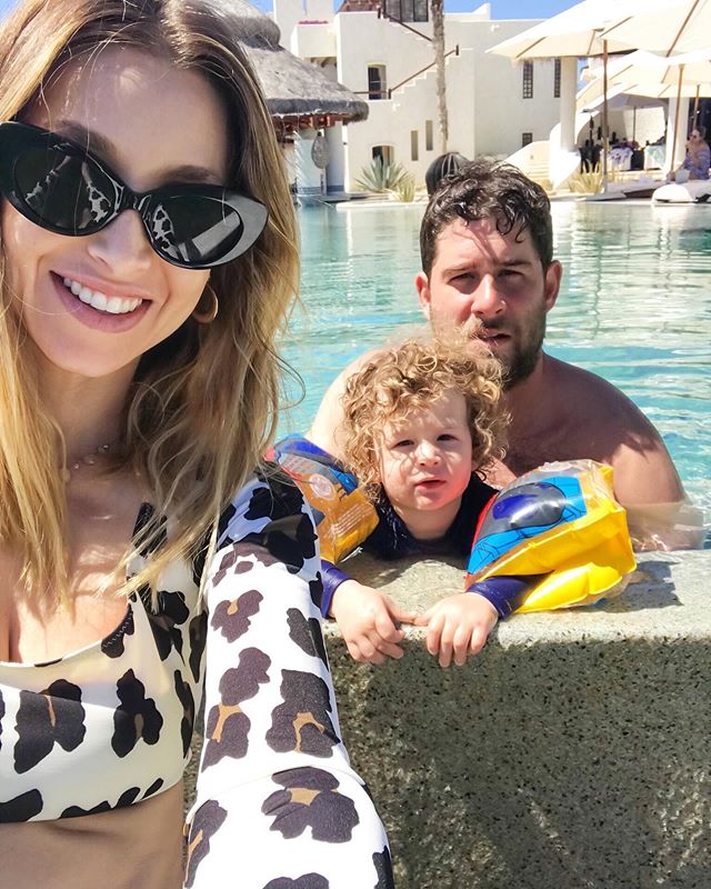 Whitney Port Takes Selfie as Husband Tim Rosenman and Son Sonny Play in Pool Behind Her