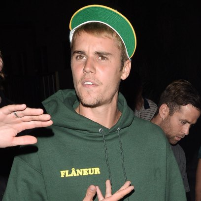 Justin bieber hits photographer