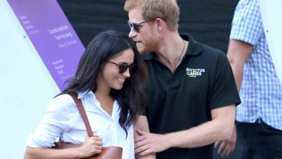 Meghan Markle and Prince Harry showing some PDA.