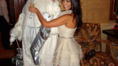 Kourtney giving drinks tosanta