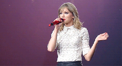 taylor swift shrugs