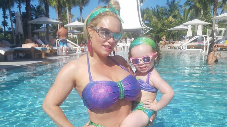 Coco Austin dragged for pushing daughter Chanel, 6, in stroller