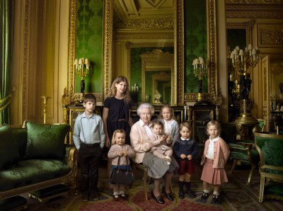Queen Elizabeth posing with her great-grandchildren