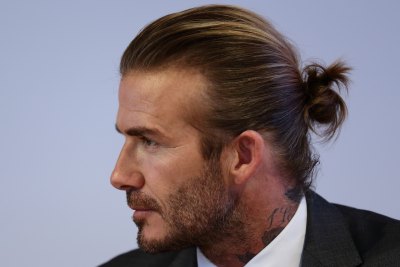 david beckham men long hair man bun getty david beckham men long hair man bun getty