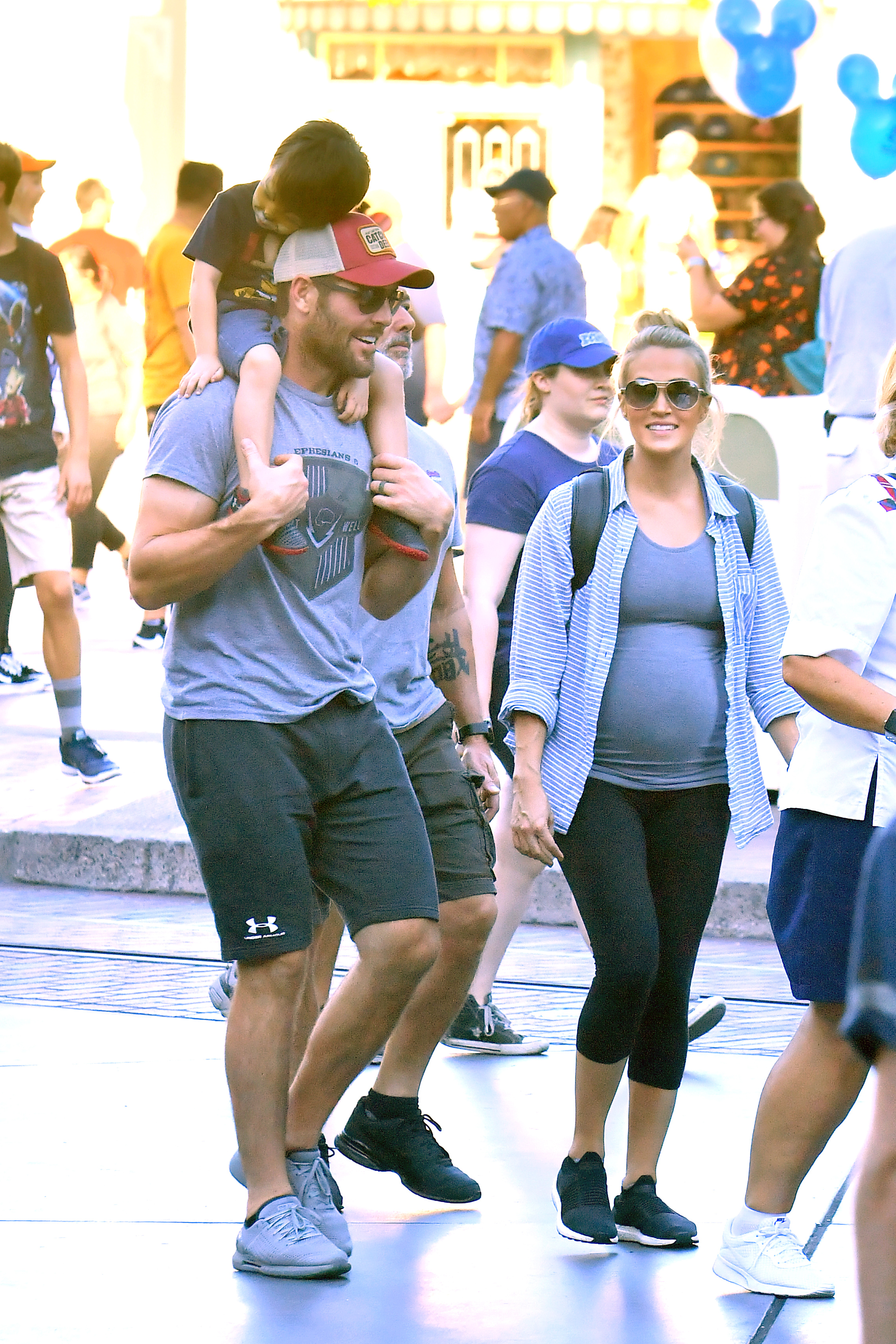 carrie underwood and mike fisher take son isaiah to disneyland