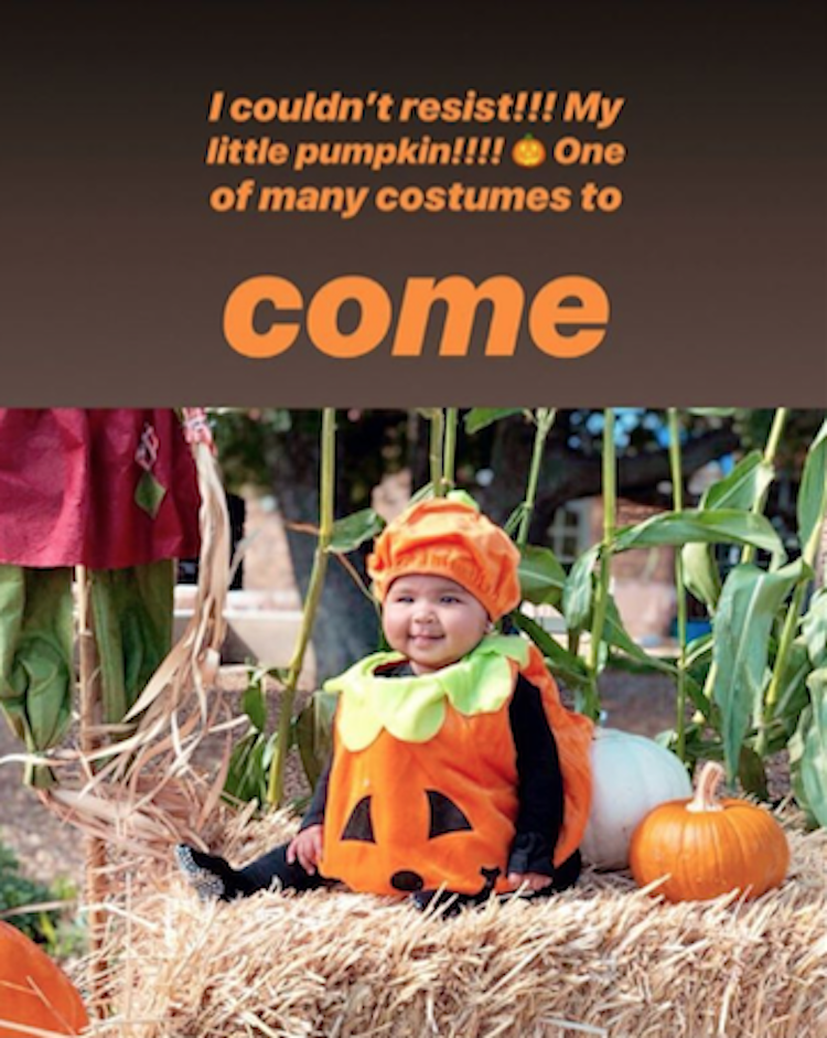 Baby True Wears Pumpkin Costume