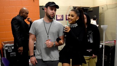 Ariana Grande and Scooter Braun walking