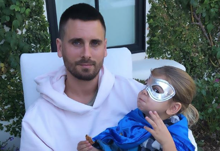 Scott and Reign Disick sitting