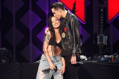 Halsey and G-Eazy showing PDA at a concert