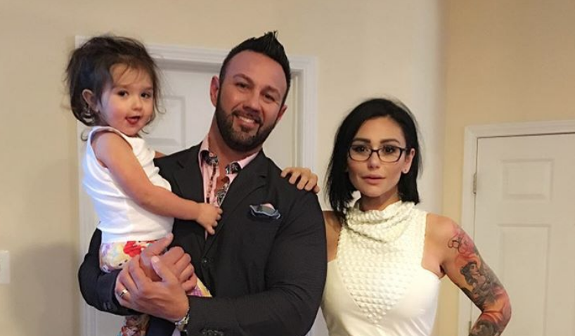 JWoww and Roger posing with their daughter