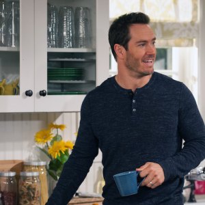 Mark Paul drinking coffee