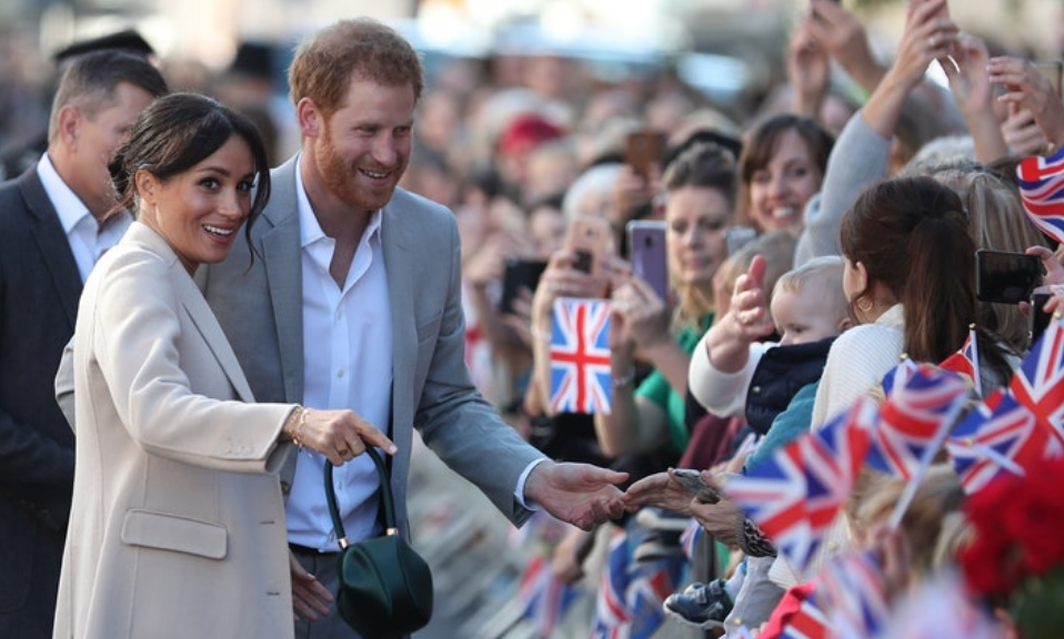 Prince harry high fives kids skipped school meghan markle