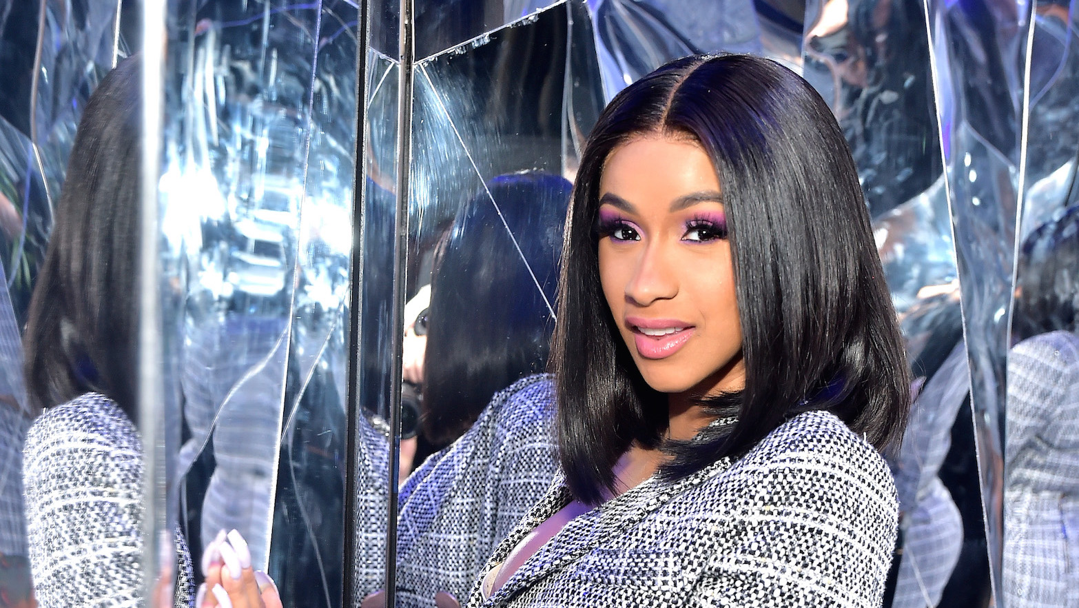 Cardi B Revamps Double Denim in Shredded Bodycon Dress and Sky-High  Louboutins After Super Bowl