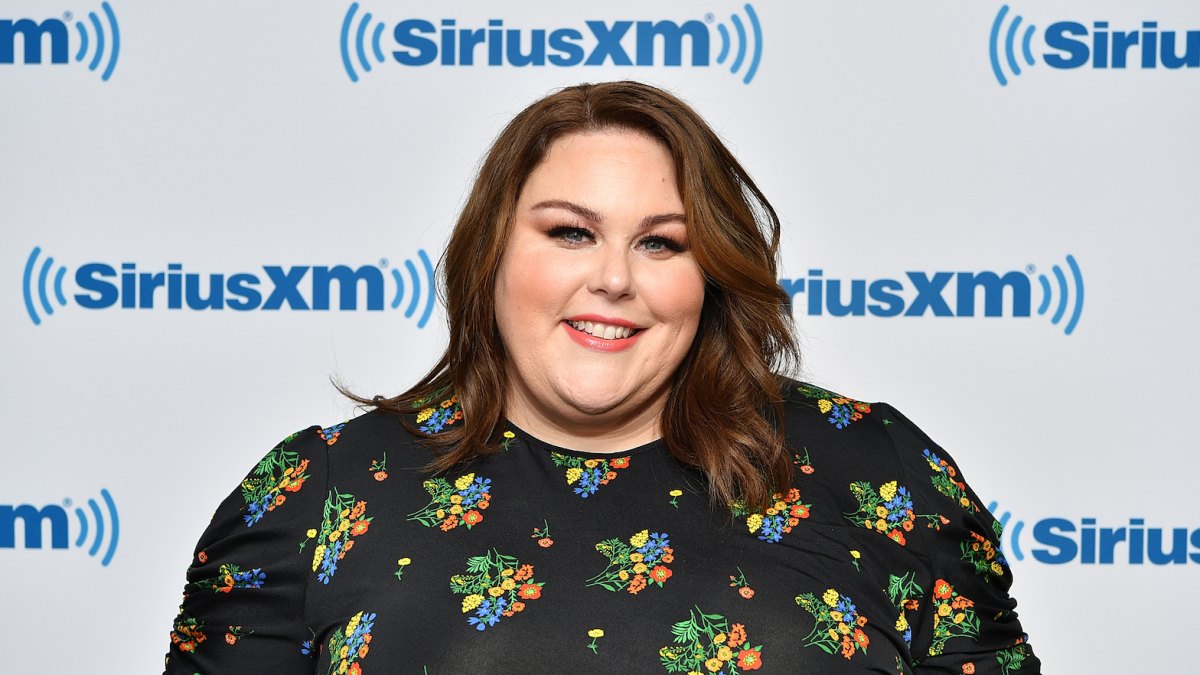 Chrissy Metz wearing a flower dress at Sirius XM studios in NYC