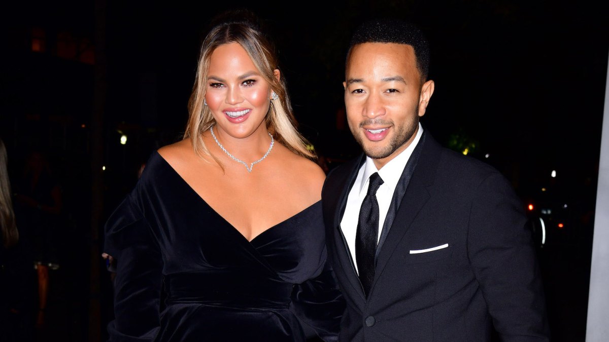 Chrissy Teigen and John Legend at night