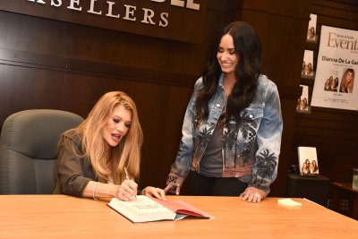 Demi and her mom at a book signing 