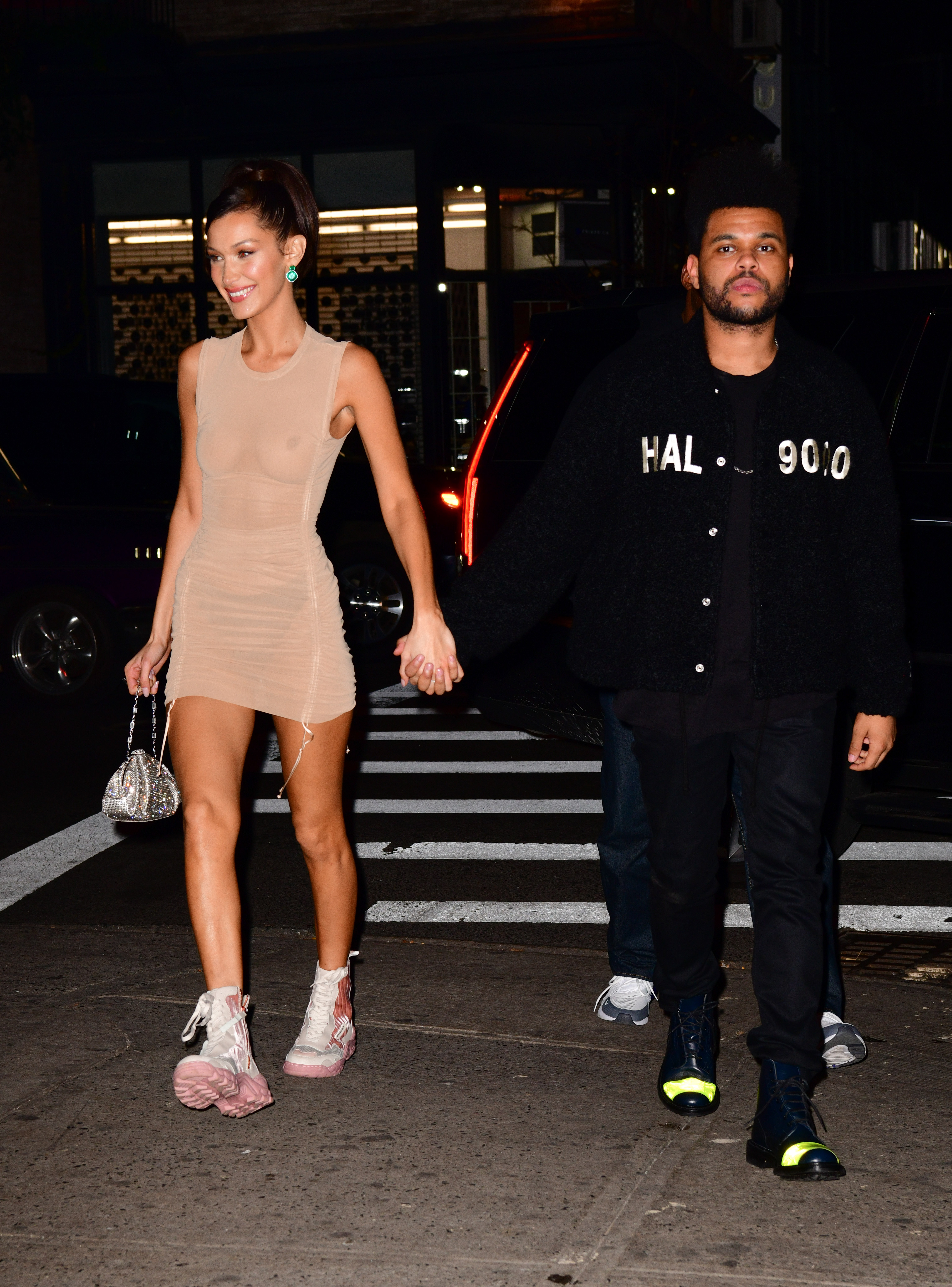 Bella and The Weeknd holding hands
