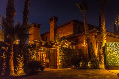 The Bachelor Mansion shot from the outside at night 