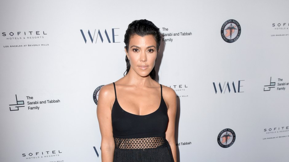 Kourtney Kardashian wearing black at an event