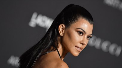 Kourtney Kardashian posing