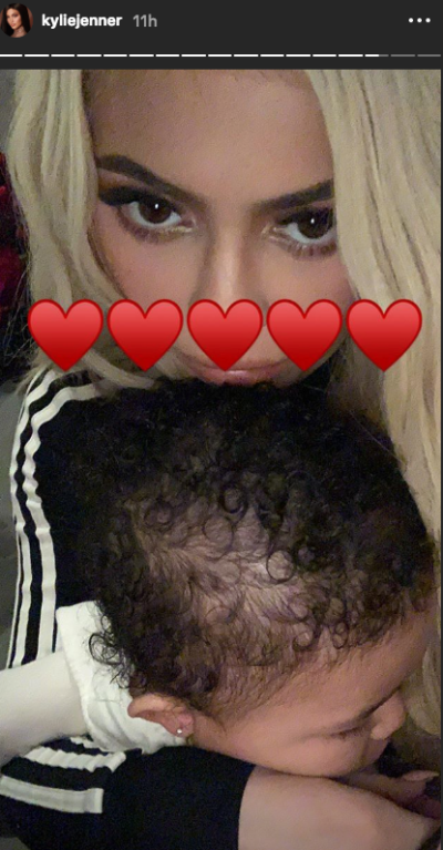 Kylie Jenner holds Stormi with heart emojis in Instagram story