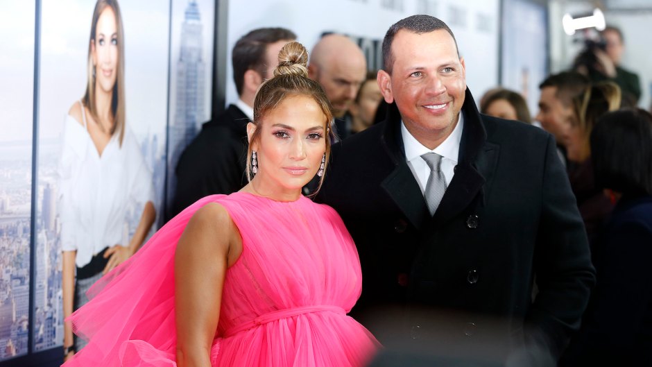 Jennifer Lopez wearing a hot pink dress with Alex Rodriguez