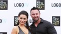 JWoww with Roger Mathews wearing black at an event