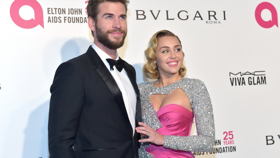 Liam Hemsworth, Tuxedo, Miley Cyrus, Pink and Silver Gown, Posing, Smiling