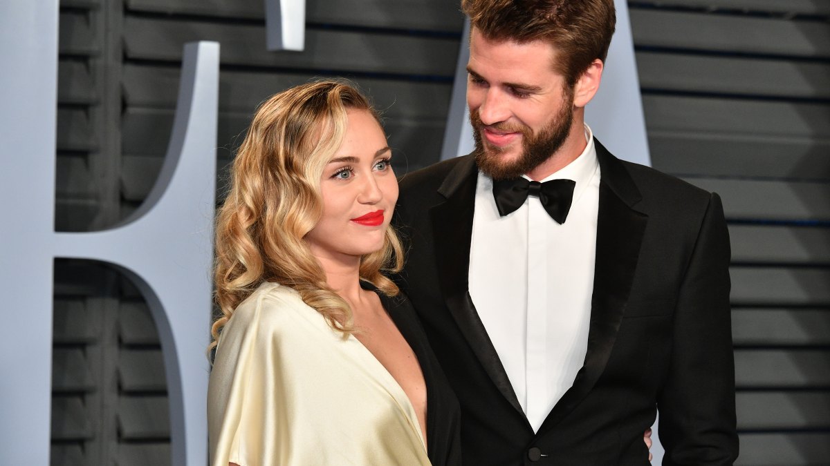 Miley Cyrus, Liam Hemsworth, Tuxedo, Gold Dress, Smiling