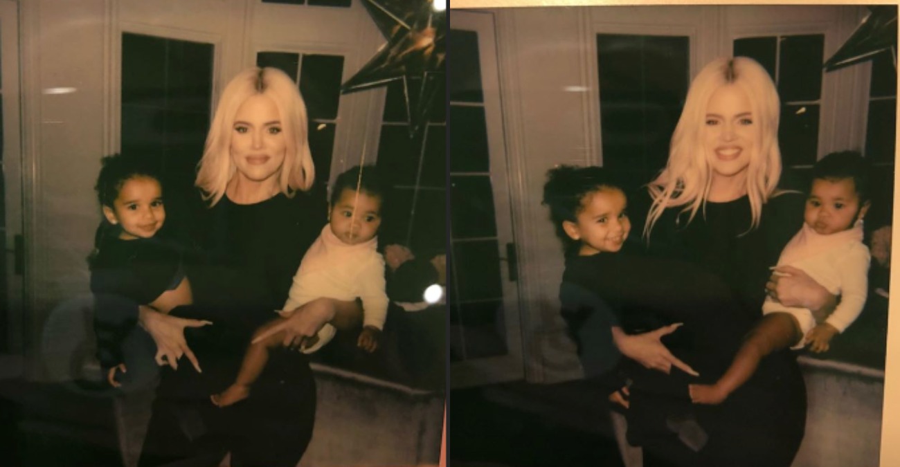 Khloe Kardashian holding Dream and True