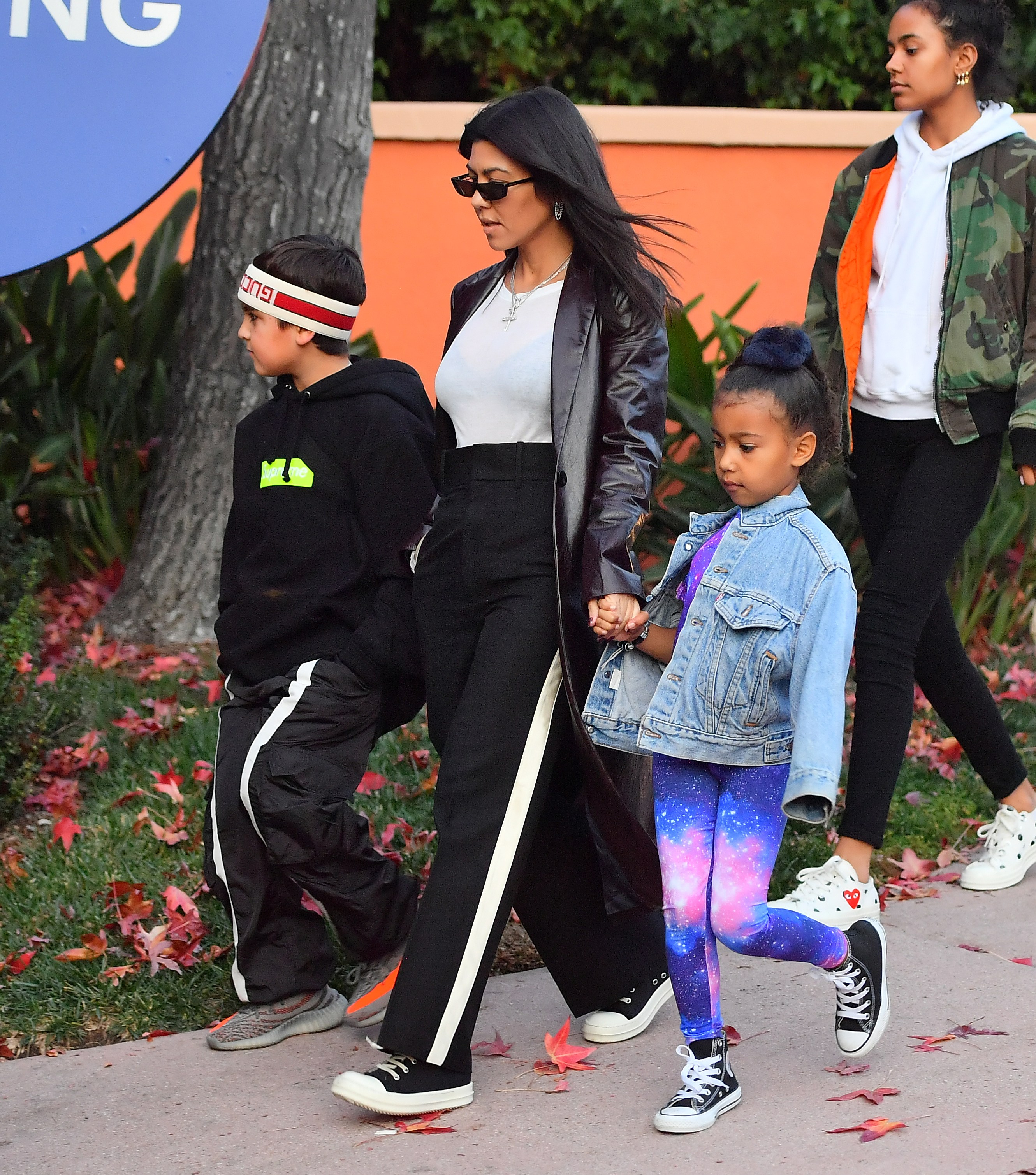 ** PREMIUM EXCLUSIVE RATES APPLY** Kourtney Kardashian and Scott Disick set their differences aside for a fun day at Universal Studios with their kids