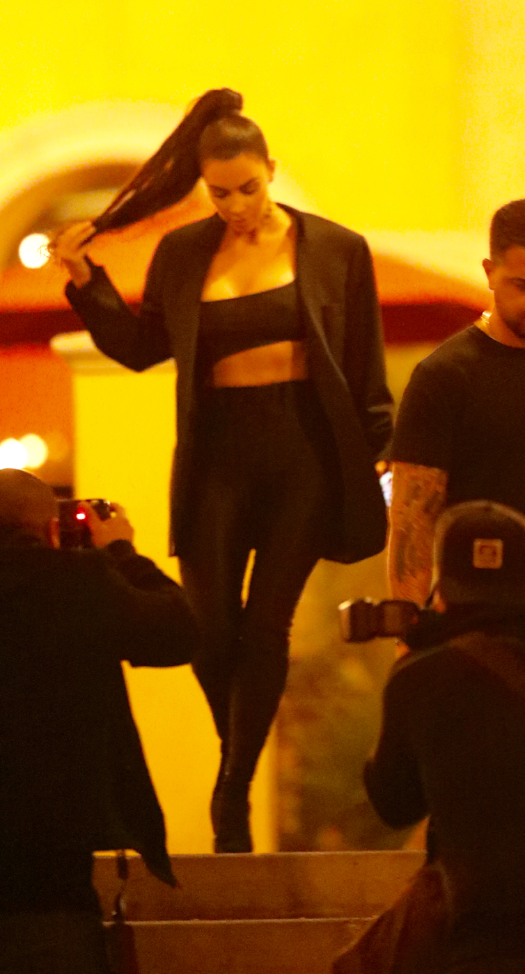 Kim Kardashian, Black Pants, Bra, Walking