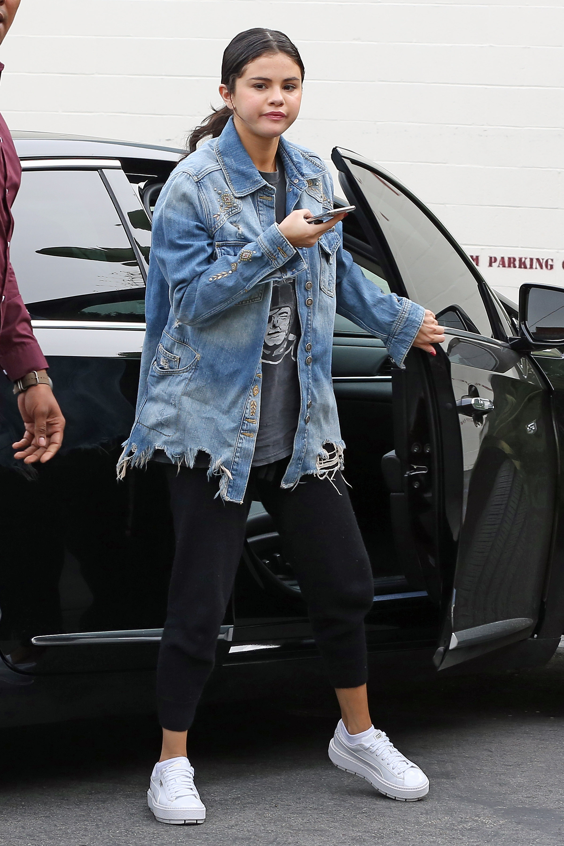 Selena Gomez, Black Pants, Jean Jacket, White Sneakers, Walking
