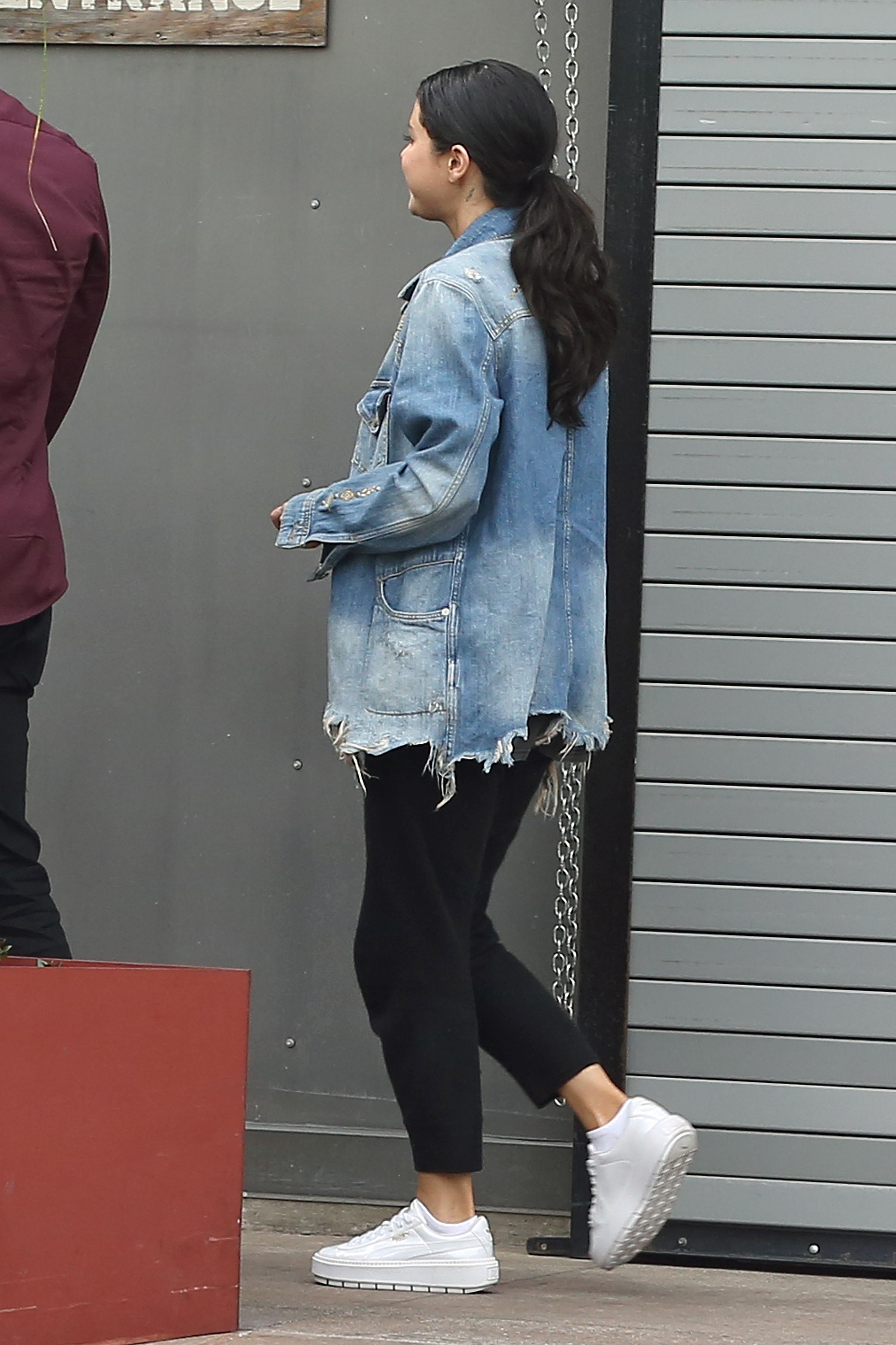 Selena Gomez, Black Pants, Jean Jacket, White Sneakers, Walking