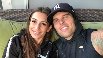 Astrid Loch with Kevin Wendt wearing a Yankee hat