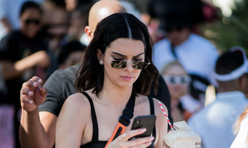 Kendall Jenner, Walking, Holding Cell Phone