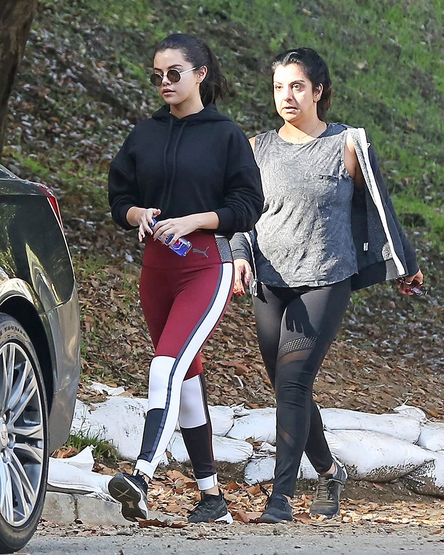 Photos of Selena Gomez Hiking in Red Pants Post-Rehab Are So Cute