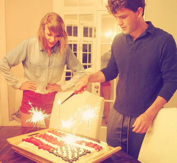 Taylor Swift with a cake