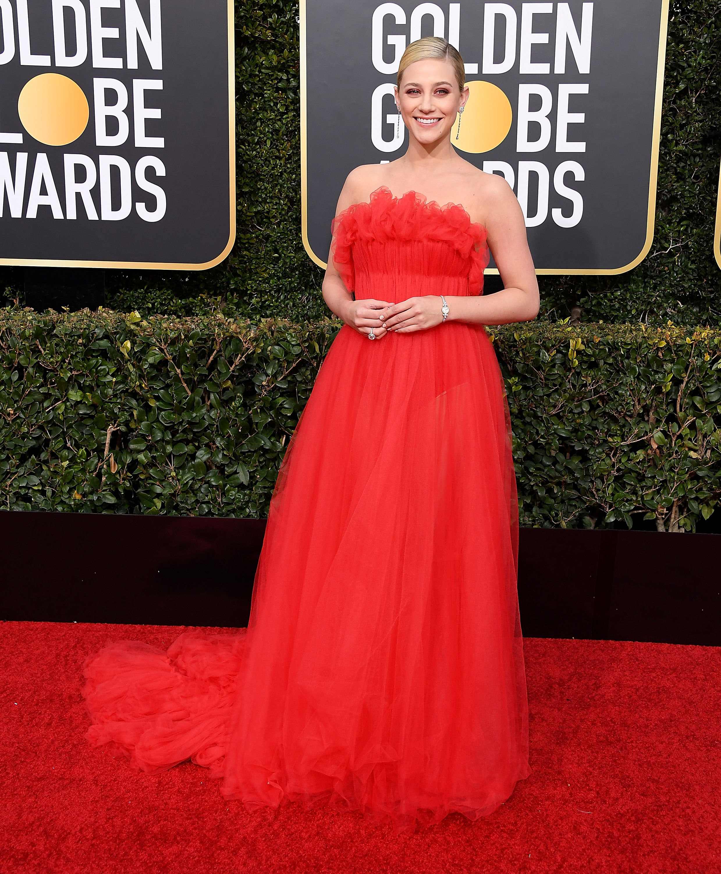 Lili Reinhart wearing red