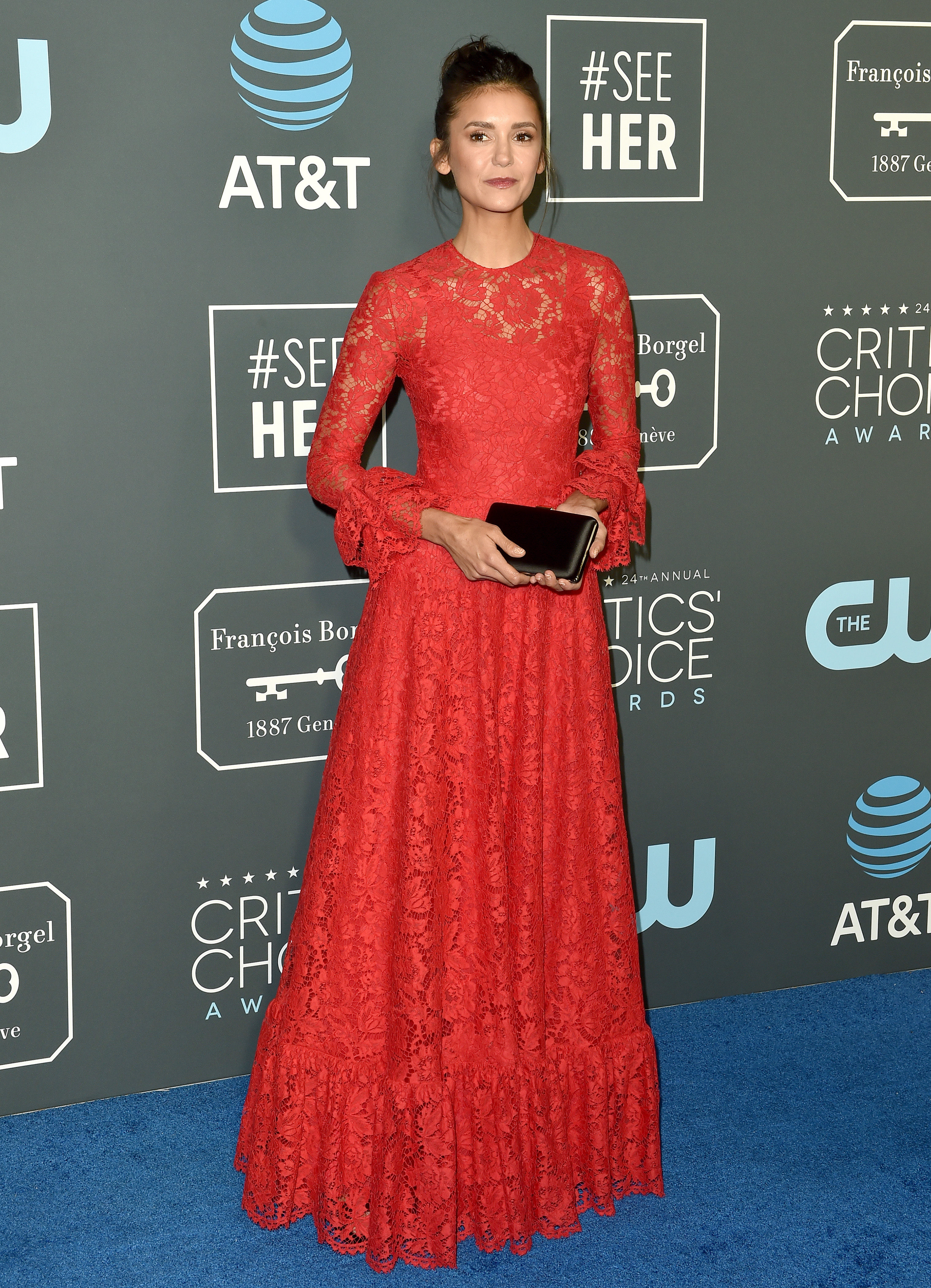 Nina Dobrev wearing red