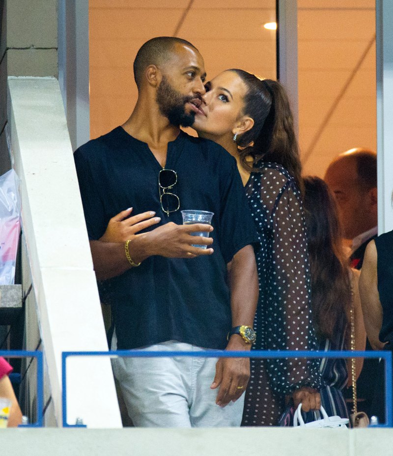 Ashley Graham leaning on her husband Justin Ervin