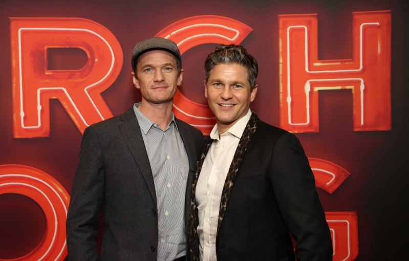 Neil Patrick Harris wearing a hat with husband David Burtka