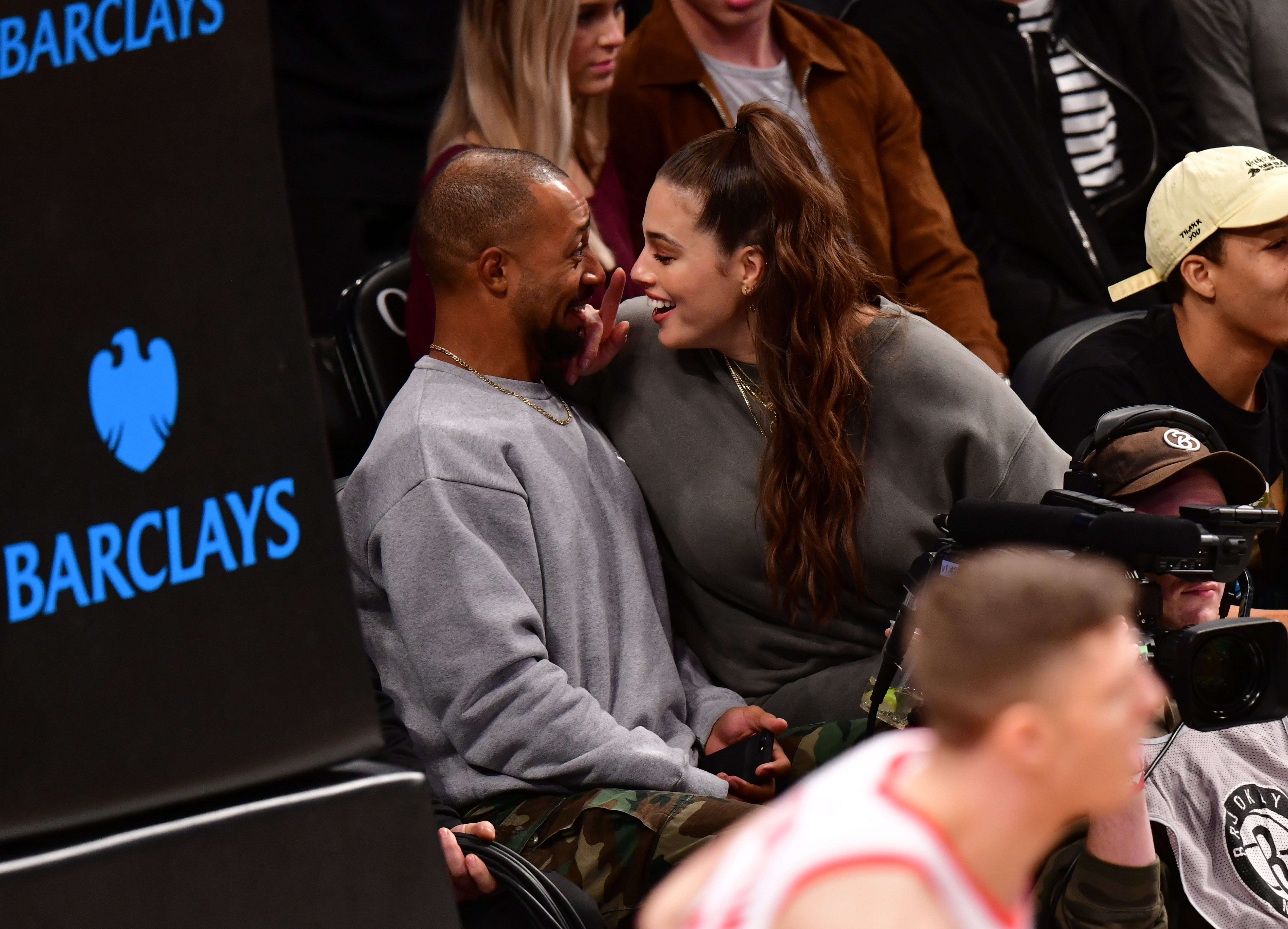 Ashley Graham kissing her husband Justin Ervin